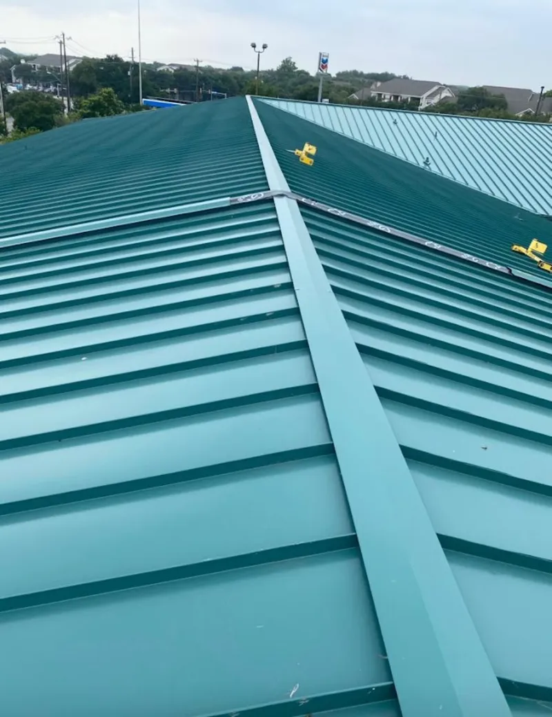 Green commercial metal roof ridge and valley for Metal Roof Repair in Plainview