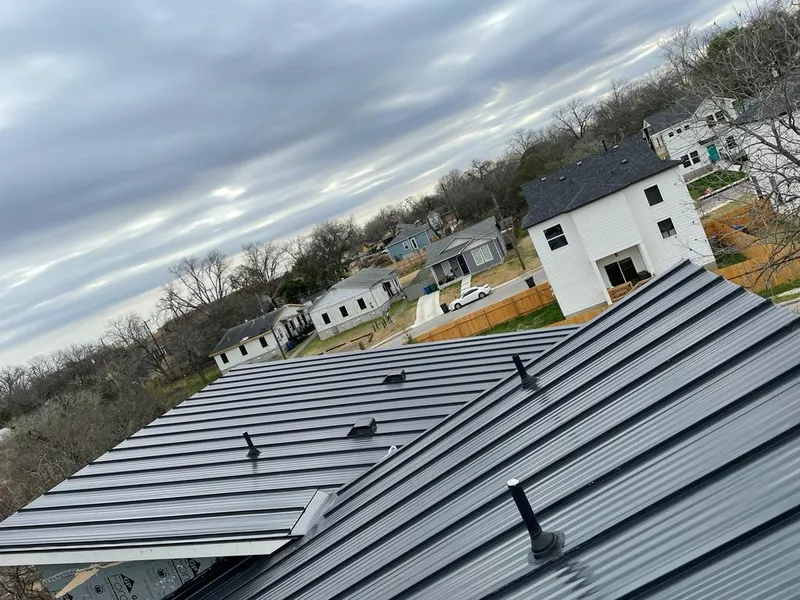 Standing seam metal roof panels with vents for Skylight Repair in Plainview